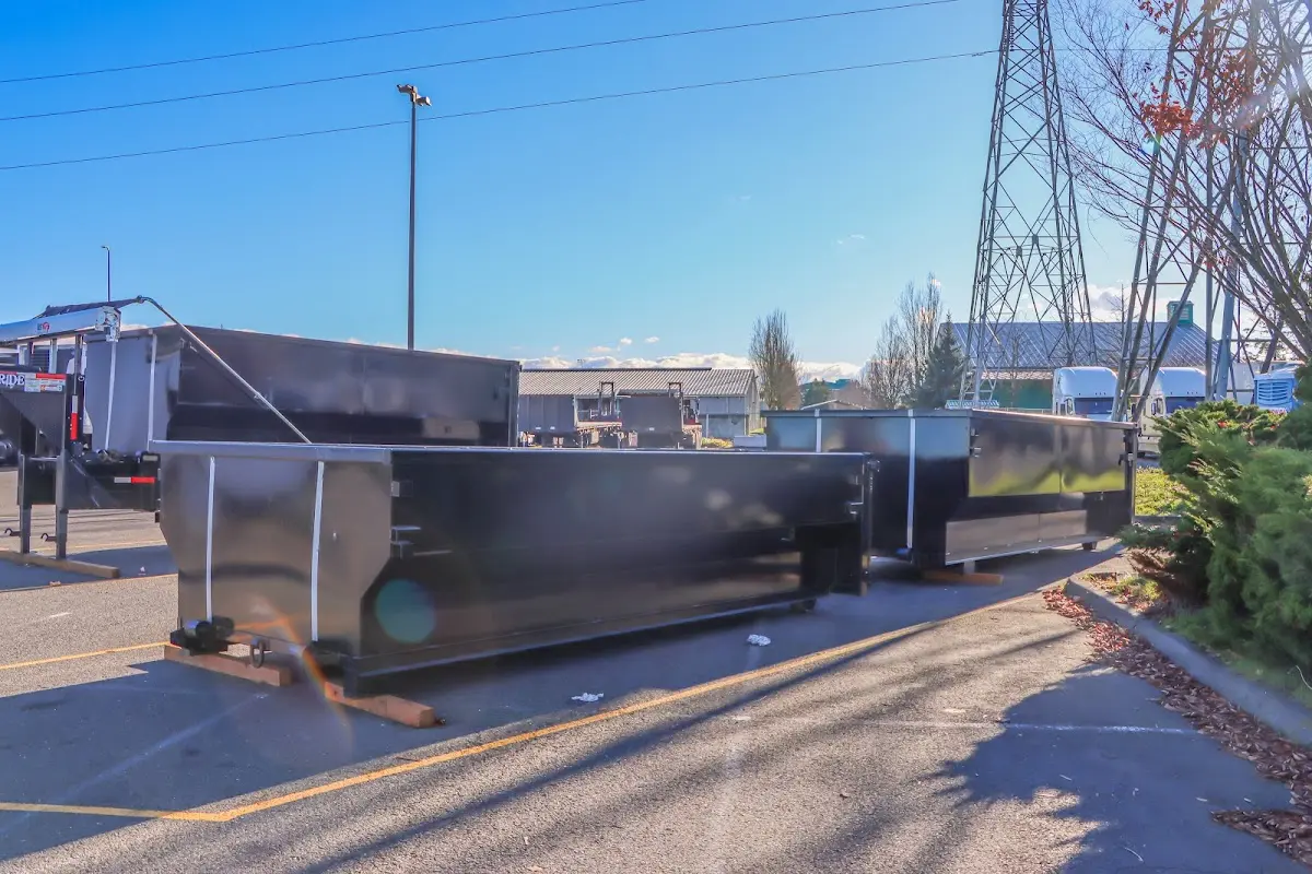 Roll-off dumpster ready for waste disposal at job site for Yard Waste Dumpster Rental in River Ridge